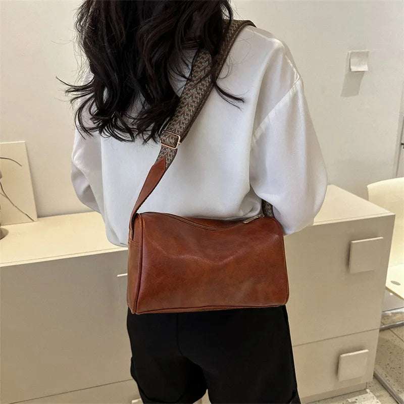 Elsa | Læder Crossbody-taske med vævet rem