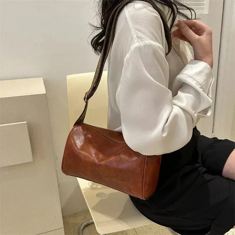 Elsa | Læder Crossbody-taske med vævet rem